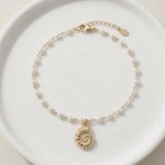 Pulseira pérolas búzio 